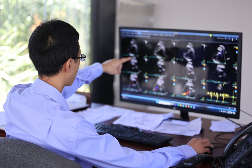 Cardiologist reviewing echocardiogram imaging